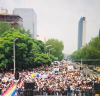 Marchers in the XXVI Marcha Del Orgullo LGBT (26th March of GLBT Pride) start at the ngel de la Independencia (The Angel of Independence), in Mexico City, Mexico. June 26, 2004. Photo Credit: Bradford McIntyre
