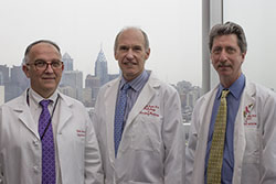 Photo: University of Pennsylvania Perelman School of Medicine researchers, L-R, Pablo Tebas, MD, Carl June, MD and Bruce Levine, PhD
