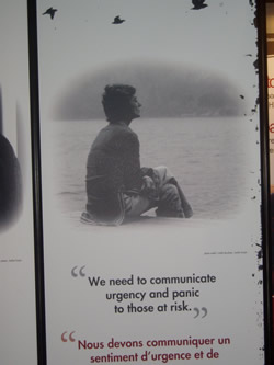 AIDS 2006: Canada Booth - Poster caption: We need to
 communicate urgency and panic to those at risk