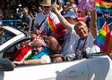 Vancouver Pride Parade 2012 - Front seat: Brian Chittock, AIDS Vancouver Executive Director and May McQueen, who has volunteered with AID'S Vancouver for over 20 years. Back seat: Danial Dex, Chair, AIDS Vancouver Board of Directors and Bradford McIntyre, living with HIV, and Vice Chair, AIDS Vancouver Board of Directors. August 5, 2012 - Photo Credit: Deni Daviau