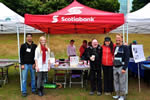 Abid Nasan, Lindsey Bruce, Bradford McIntyre, Jessica Wood and Brian Chittock manned the AIDS Vancoouver Community Table at the Scotiabank AIDS Walk for Life Vancouver. Photo Credit: Jennifer Strang PHOTOGRAPHY