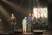 AIDS Vancouver Chair, Board of Directors, Daniel Dex, introduces the 2012 Queen Elizabeth II Diamond Jubliee Medal recipients, May McQueen: AIDS Vancouver Volunteer, Joel Nim Cho Leung: AIDS Vancouver Volunteer, and Bradford McIntyre: AIDS Vancouver Vice-Chair, Board of Directors, at AIDS Vancouver's 30TH Anniversary Celebration, July 30th 2013.