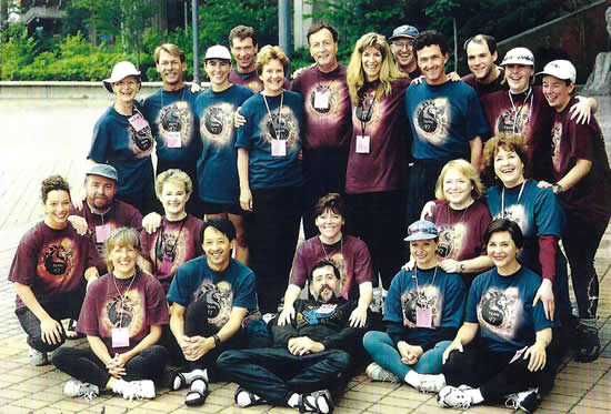 Photo: Angels on Dragons: Dragon Boat Team competeing in 5 races at the Canadian International Dragon Boat Festival, June 21-22, 1997 - Vancouver, B.C. Canada. Angels on Dragons Team: Todd Wong, Bradford, McIntyre, Stephen Archibald, Robekha Ashley, George Baron, Lois Brassart, Craig Brown, Chrystal Buschau, Paddy Doran, Boyd Fuller, Judy Gaudin, Juhli Hansen, Steven Hinder, Barbara Holmes, Helen, Jackson, Sandra Kewley, Marilyn Knipp, Dennis McCrossan, Doug McIntyre, Bev McLean, Lisa Ruckaber, Maxine Searle, Leesa Strimbicki, Maureen Supeene, and Cecile Williams.