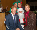 Photo: Bradford McIntyre (Right) & partner Deni Daviau (Left) on Santa's lap at the Positive Living BC Members Holiday Season Dinner - December 6, 2013.