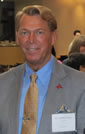 Bradford McIntyre, AIDS Vancouver Board Vice Chair, greets guests at the Fifth Annual Celebrity Dim Sum, June 2, 2012.