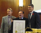 Vancouver Mayor Gregor Robertson, Brian Chittock, Executive Director of AIDS Vancouver and Bradford McIntyre AIDS Vancouver Board Vice Chair. AIDS Vancouver Positive Change Red Ribbon Campaign - November 1, 2011 -  www.aidsvancouver.org