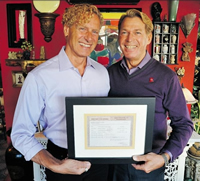 Bradford McIntyre, right, is HIV-positive, but still found love. He stands with husband Deni Daviau and their marriage certificate in their Vancouver home. Photograph by: Arlen Redekop, PNG, October 21, 2012.