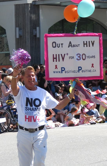 Bradford McIntyre, HIV positive for 30 years, marching in the Vancouver PRIDE Parade, 2014.