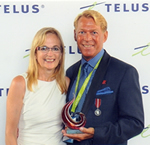Photo: Maxine Davis, Executive Director of the Doctor Peter Centre Presented Bradford McIntyre with the Pride Legacy Award at the Pride Legacy Awards presented by TELUS on july 20, 2013.