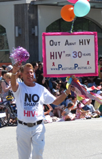 Photo: Bradford McIntyre, is Out About HIV, HIV+ for 30 years, wearing N0 SHAME ABOUT BEING HIV+ T-Shirt to fight HIV/AIDS Stigma, in the Vancouver PRIDE Parade. August 3, 2014.