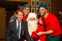 Photo: Bradford McIntyre, On Santa's lap at the Positive Living BC Members' Holiday Season Dinner, Dec 4, 2014. Photo By Kangsoon Park