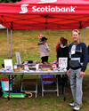 Bradford McIntyre, HIV-Positive since 1984, and Director, Board of Directors, AIDS Vancouver, volunteering at the AIDS Vancouver community table, at Scotiabank AIDS Walk for Life Vancouver, 2011. Photo Credit: Jennifer Strang PHOTOGRAPHY