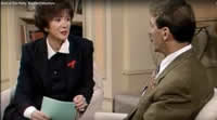 Photo: Dini Petty talks with Bradford McIntyre, living with HIV, a guest on the Dini Petty Show, World AIDS Day, 1994.