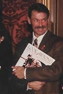 Book Launch - Bradford McIntyre from Vancouver, was in attendance and presented with LOOK BEYOND The Faces & Stories of People with HIV/AIDS by Michelle Valberg. Parliament Buildings, Ottawa, Canada. November 28, 1996