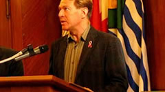 AIDS Vancouver Director Bradford McIntyre presents the AIDS Vancouver We Care RED RIBBON Campaign PSA's (Public Service Announcement) to Vancouver City Council at City Hall, Vancouver,Bc., Canada.