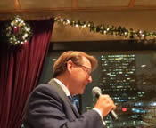 Photo: Bradford McIntyre singing The Christmas Song (Chestnuts Roasting on an Open Fire), at The Positive Living BC Annual Members Holiday Season Dinner, held at the Law Courts Inn Restaurant, December 4, 2014. Vancouver, B.C. Canada.