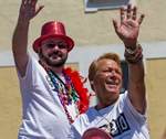 Photo: Brian Chittock, AIDS Vancouver Executive Director and Bradford McIntyre, AIDS Vancouver Vice Chair, on the AIDS Vancouver Float at the 2013 Vancouver PRIDE Parade, August 4, 2013.