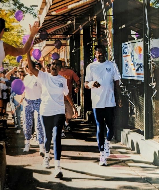 Former WXYZ anchor Diana Lewis and her cousin led off AIDS Walk Detroit in 1999. Here, they are walking through the streets of downtown Royal Oak. Photo: Jason A. Michael Former WXYZ anchor Diana Lewis and her cousin led off AIDS Walk Detroit in 1999. Here, they are walking through the streets of downtown Royal Oak. Photo: Jason A. Michael