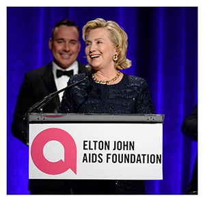 Photo: EJAF Founder Sir Elton John and Chairman David Furnish presented EJAF's very first <em>Founder's Award to former Secretary of State Hillary Rodham Clinton. www.ejaf.org