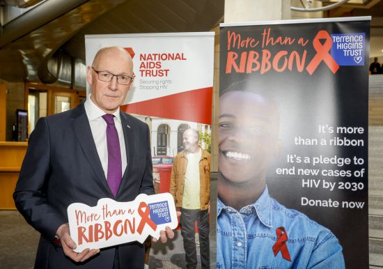 First Minister John Swinney MSP marking World AIDS Day 2024 in the Scottish Parliament. First Minister John Swinney MSP marking World AIDS Day 2024 in the Scottish Parliament.