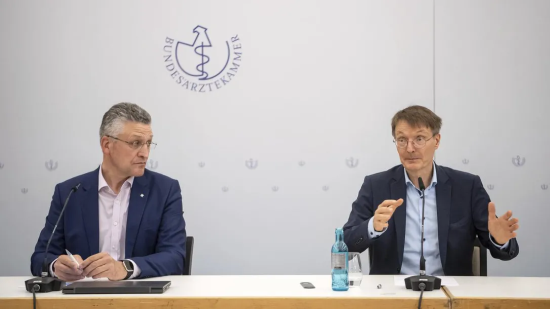 German minister of health Karl Lauterbach, right, speaks at a press conference on monkeypox on May 24.