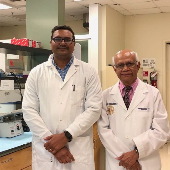 Photo: Nagesh Kolishetti, Ph.D., and Madhavan Nair, Ph.D., in an immunology and nanomedicine lab at HWCOM.