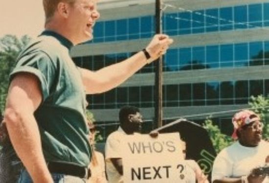 Mark S. King protesting in Atlanta, 1993.