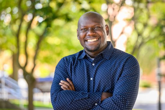 Poverty, unemployment, lack of transportation and inadequate access to food and water are among the challenges that prevent displaced youths living in temporary settlements in Kampala, Uganda, from regularly using condoms and accessing HIV prevention services, social work professor Moses Okumu found in a recent survey. Photo by Fred Zwicky Moses Okumu