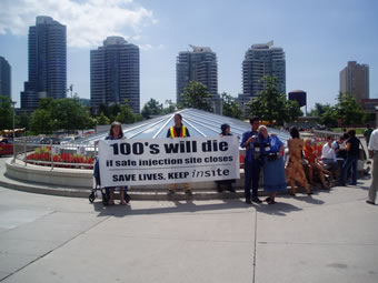 Photo: AIDS 2006 - 100's will die if safe injection site closes - Save Lives, Keep Insite. AIDS 2006 - 100's will die if safe injection site closes - Save Lives, Keep Insite.