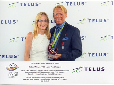 Photo: Maxine Davis, Executive Director of the Doctor Peter Centre, presented Bradford McIntyre with the Pride Legacy Award in the PINK Category: Sexuality (Sexual Health + HIV/AIDS Awareness).