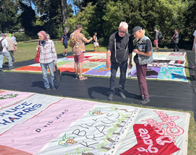 Quilt Co-Founders Cleve Jones and Gert McMullin look at some of the original panels of the Quilt on display in San Francisco, June 11-12, 2022.