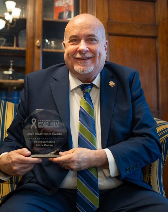Rep. Mark Pocan receives a Champion Award from the U.S. Business Action to End HIV for his role in building support on Capitol Hill for HIV prevention and treatment.