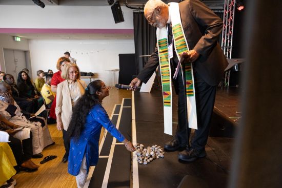 Photo: Rev. Edwin C. Sanders and a young woman from India honouring a person who lost their life to an AIDS-related condition. Photo MCK/WCC Rev. Edwin C. Sanders and a young woman from India honouring a person who lost their life to an AIDS-related condition. Photo MCK/WCC