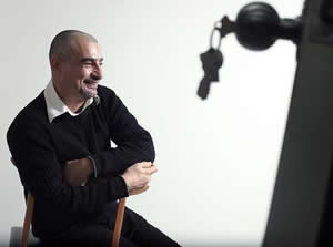 Sergio Martinez, in his office at the AIDS Committee of Toronto, is eager to see a Broadway play now that the U.S. will let him travel there again. (Jan. 6, 2010)
TARA WALTON/TORONTO STAR