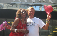 Photo: Sibel Thrasher (Singer, Actress) & Bradford McIntyre (HIV/AIDS Advocate), on the AIDS Vancouver Float, in the Vancouver PRIDE Parade, 2013.