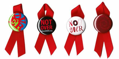4 red AIDS ribbons with buttons reading "Not Over"