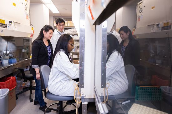 Yan, Chen and Obi in lab