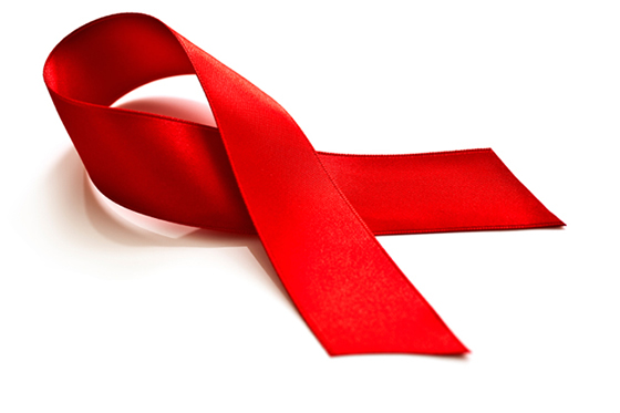 Aids ribbon on white background - Credit: Adobe