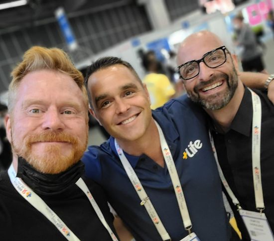 Mark S. King, Karl Schmid (Plus Life Media) and Dr. Demetre Daskalakis at USCHA 2022