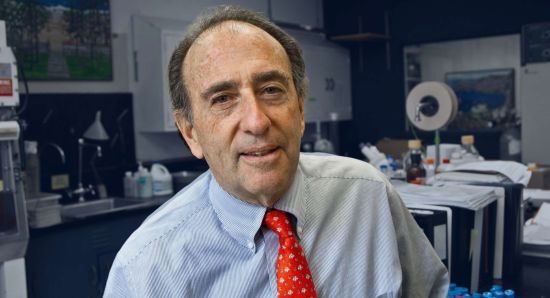 Jay Levy, MD, AIDS and cancer researcher, educator, and pioneer: From early HIV/AIDS research to COVID-19 lectures at the summer Science Camp program in sponsored by the School of Pharmacy in May 2024. Photo by Susan Merrell Jay Levy poses in red tie in laboratory. Photo by Susan Merrell